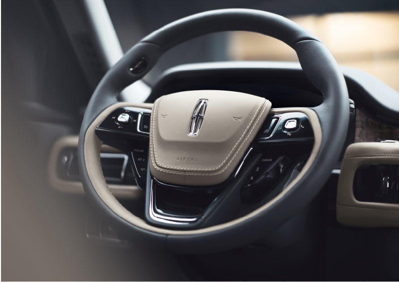 The intuitively placed controls of the steering wheel on a 2023 Lincoln Aviator® SUV | LaFontaine Lincoln Flushing in Flushing MI