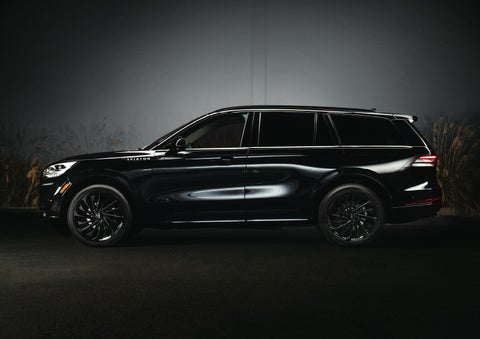 A 2024 Lincoln Aviator® SUV is shown in the Infinite Black exterior color | LaFontaine Lincoln Flushing in Flushing MI