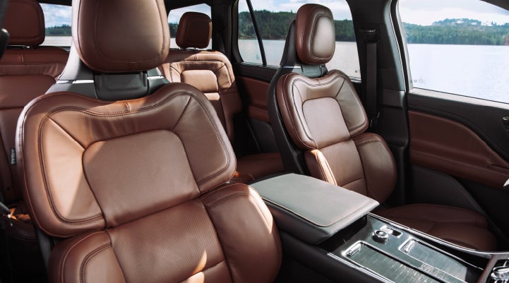 The front row's Perfect Position Seats in a 2024 Lincoln Aviator® Reserve model with Ebony Roast interior | LaFontaine Lincoln Flushing in Flushing MI