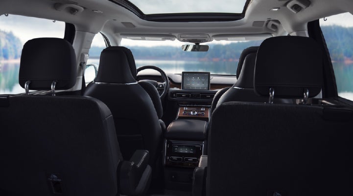 The interior of a 2024 Lincoln Aviator® SUV from behind the second row | LaFontaine Lincoln Flushing in Flushing MI
