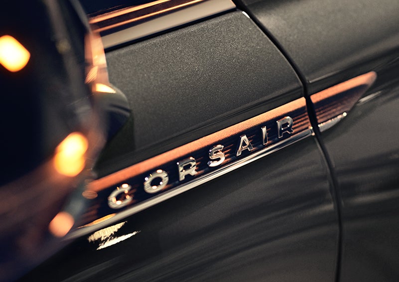 The stylish chrome badge reading “CORSAIR” is shown on the exterior of the vehicle. | LaFontaine Lincoln Grand Blanc in Flint MI