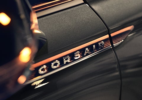 The stylish chrome badge reading “CORSAIR” is shown on the exterior of the vehicle. | LaFontaine Lincoln Flushing in Flushing MI