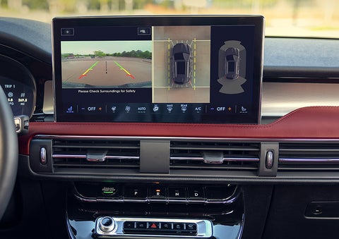 The driver of a 2024 Lincoln Corsair® SUV is shown selecting the drive mode. | LaFontaine Lincoln Grand Blanc in Flint MI