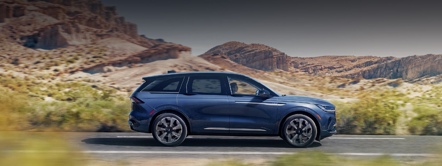 A 2024 Lincoln Nautilus® SUV is being driven in a desert setting. | LaFontaine Lincoln Grand Blanc in Flint MI