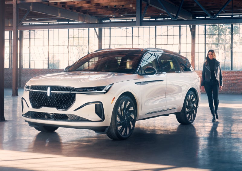 A person approaches a 2024 Lincoln Nautilus® SUV. | LaFontaine Lincoln Grand Blanc in Flint MI