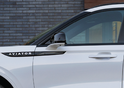 The driver’s door of a white 2025 Lincoln Aviator® SUV is showcased. | LaFontaine Lincoln Grand Blanc in Flint MI