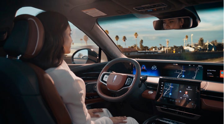A person is shown driving hands-free on the highway with available Lincoln BlueCruise technology. | LaFontaine Lincoln Grand Blanc in Flint MI