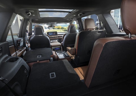 One side of the PowerFold® third-row seat and a second-row seat are folded forward in the 2026 Lincoln Aviator® SUV. | LaFontaine Lincoln Grand Blanc in Flint MI