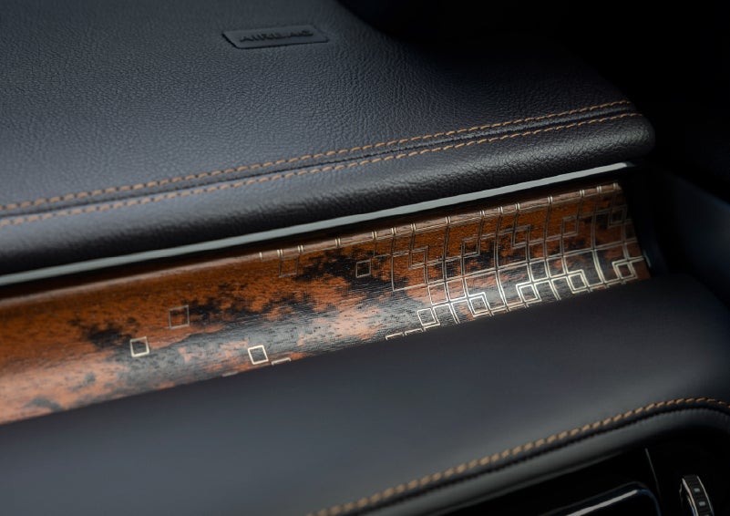A close-up shot of the 2026 Lincoln Aviator® dashboard with unique black and brown accents and brown stitching. | LaFontaine Lincoln Grand Blanc in Flint MI