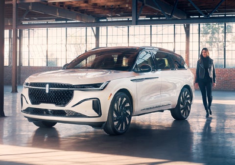 A person approaches a 2026 Lincoln Nautilus® SUV. | LaFontaine Lincoln Grand Blanc in Flint MI