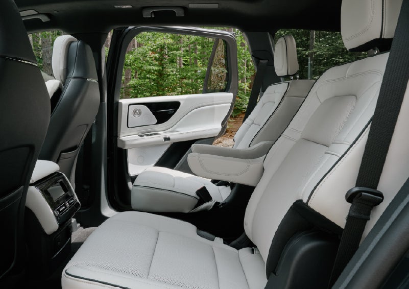 A side view of the second row with captain’s chairs in a 2027 Lincoln Aviator® Black Label™ SUV. | LaFontaine Lincoln Grand Blanc in Flint MI