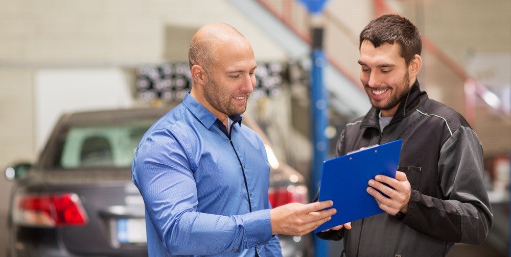 Service Technician Helping a Customer