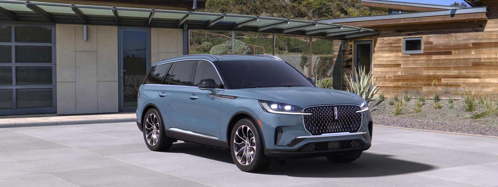 A 2026 Lincoln Aviator® SUV is parked at a mountain overlook | LaFontaine Lincoln Flint in Flint MI