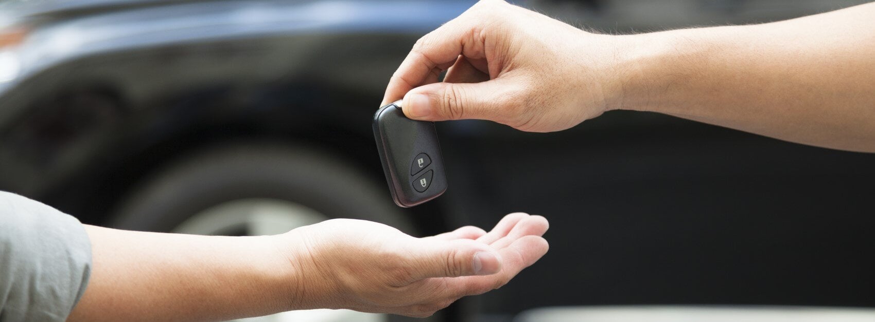 Customer Receiving the Keys to Their Used Vehicle