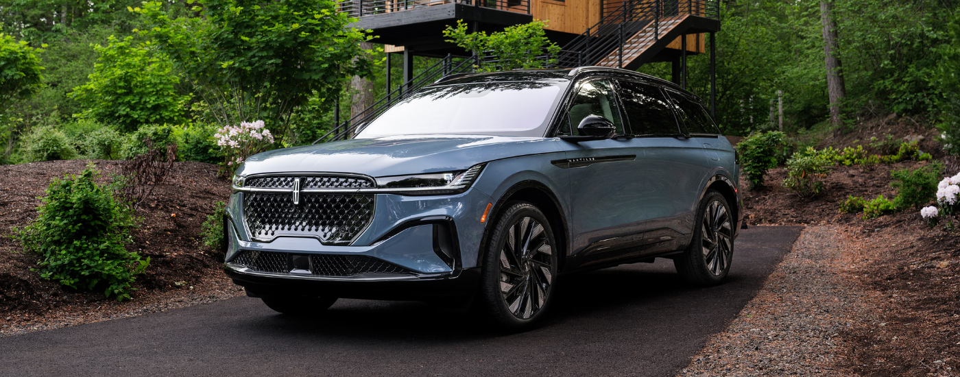 Blue 2026 Lincoln Nautilus parked in a driveway